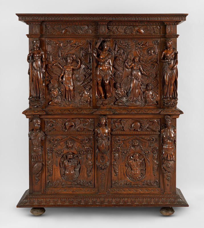 A late Renaissance walnut cabinet (armoire à deux corps)
