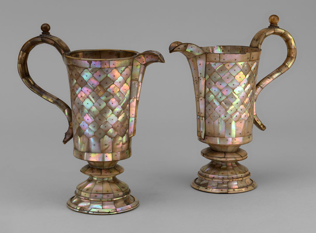 A pair of mother-of-pearl ewers